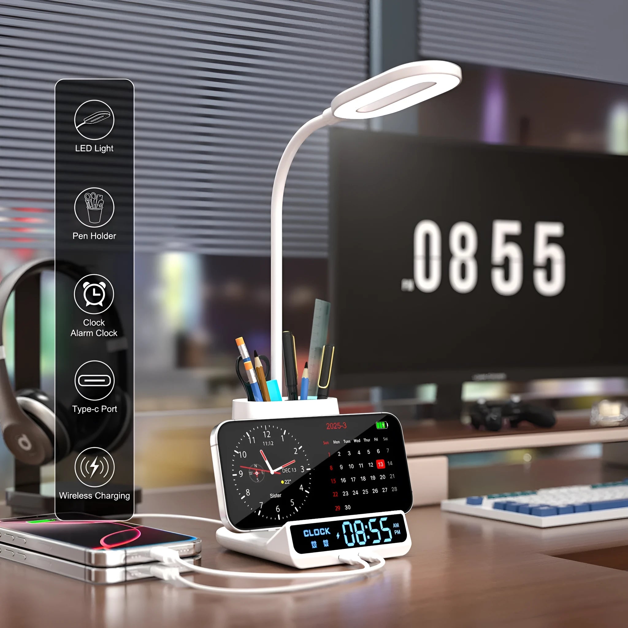 Modern black and white desk lamp with wireless charging pad, pen holder, and storage compartment.