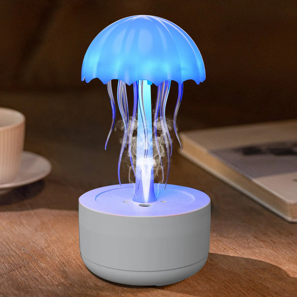 White jellyfish design humidifier and essential oil diffuser with colourful LED night light on desktop