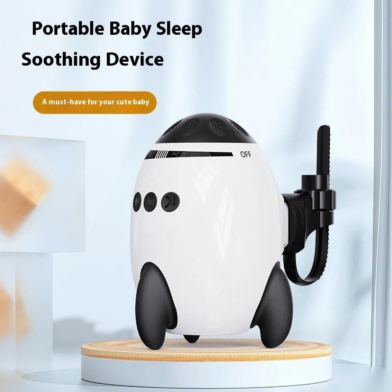 White portable baby sleep comforter with automatic shaking and Bluetooth connectivity, shown next to a stroller.