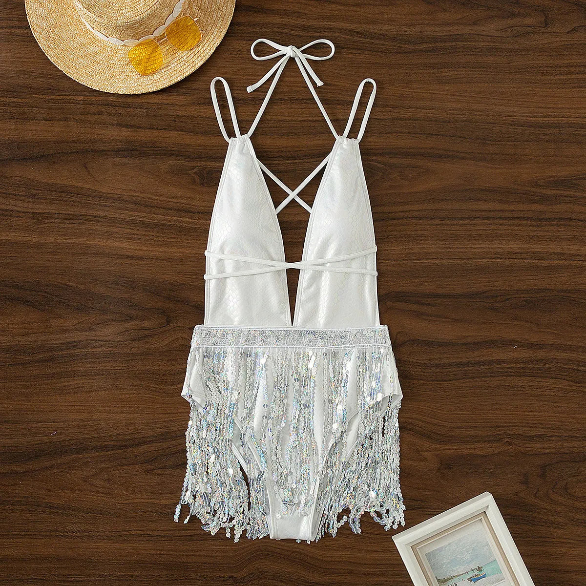 White deep V-neck one-piece swimsuit with sleeveless design for swimming