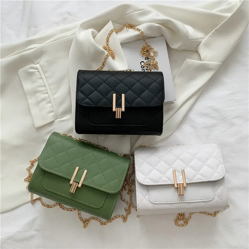 Women's minimalist crossbody bag with diamond lattice chain design in PU leather, showing adjustable strap and solid colour options