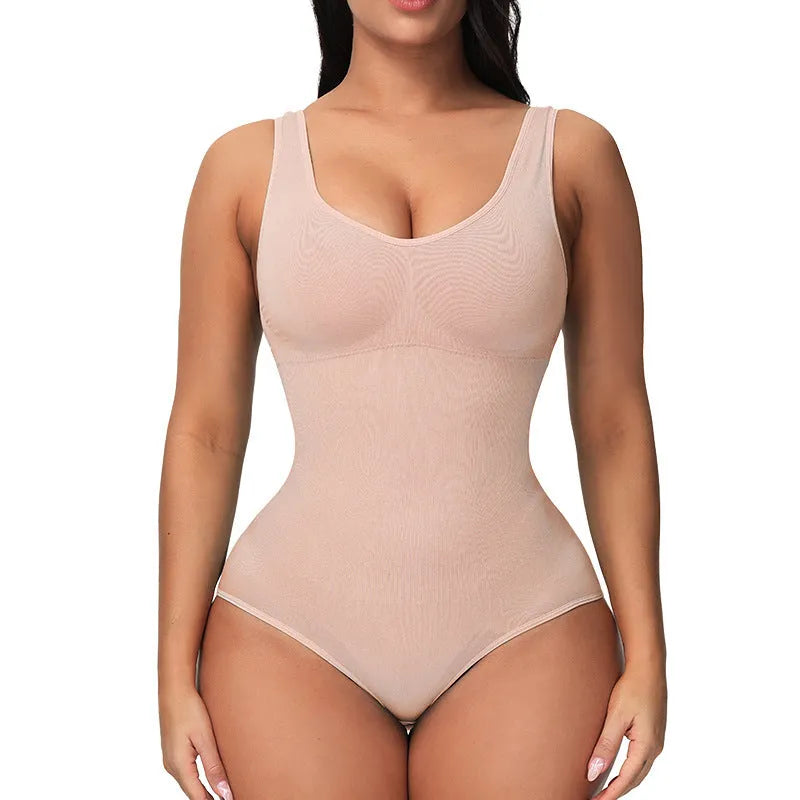 Women's seamless nylon shaping bodysuit in apricot colour on a hanger.