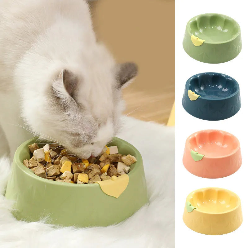 Green plastic anti-tipping pet bowl for dog and cat food and water.