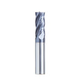 Set of straight shank carbide milling cutters with spiral edges on a workshop bench.