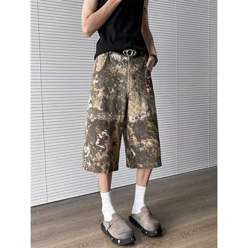 Yellow jeans with snake pattern camouflage design and cropped length