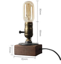 Water pipe table lamp with wood and iron construction measuring 9cm by 13cm