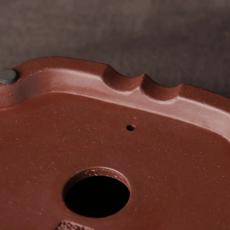 Handmade purple clay bonsai basin with traditional Chinese plain design measuring 25x20x7cm