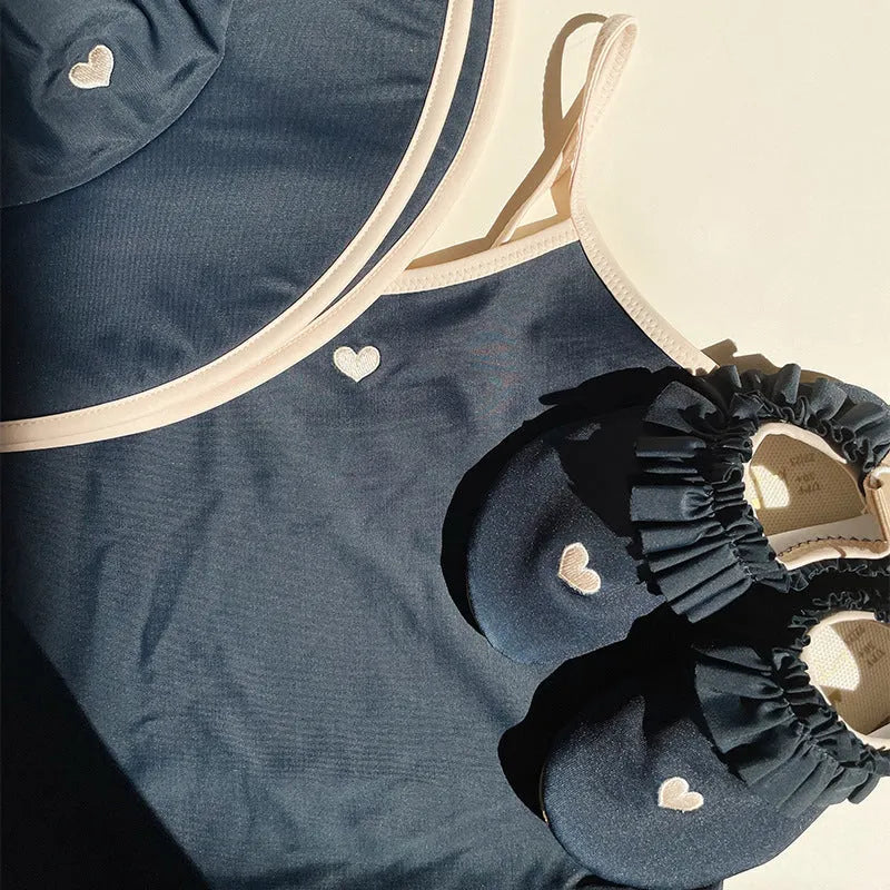 Dark blue baby split swimsuit for girls with high elasticity lycra lining, sizes 90cm to 130cm.