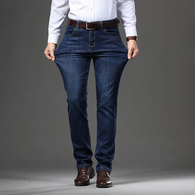 Woman wearing loose fit high elasticity straight-leg jeans in K276 blue.