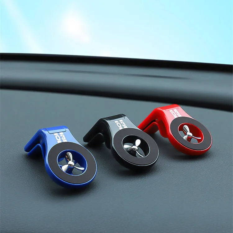 Magnetic car phone holder mounted on car air vent with smartphone attached and adjustable angle bracket