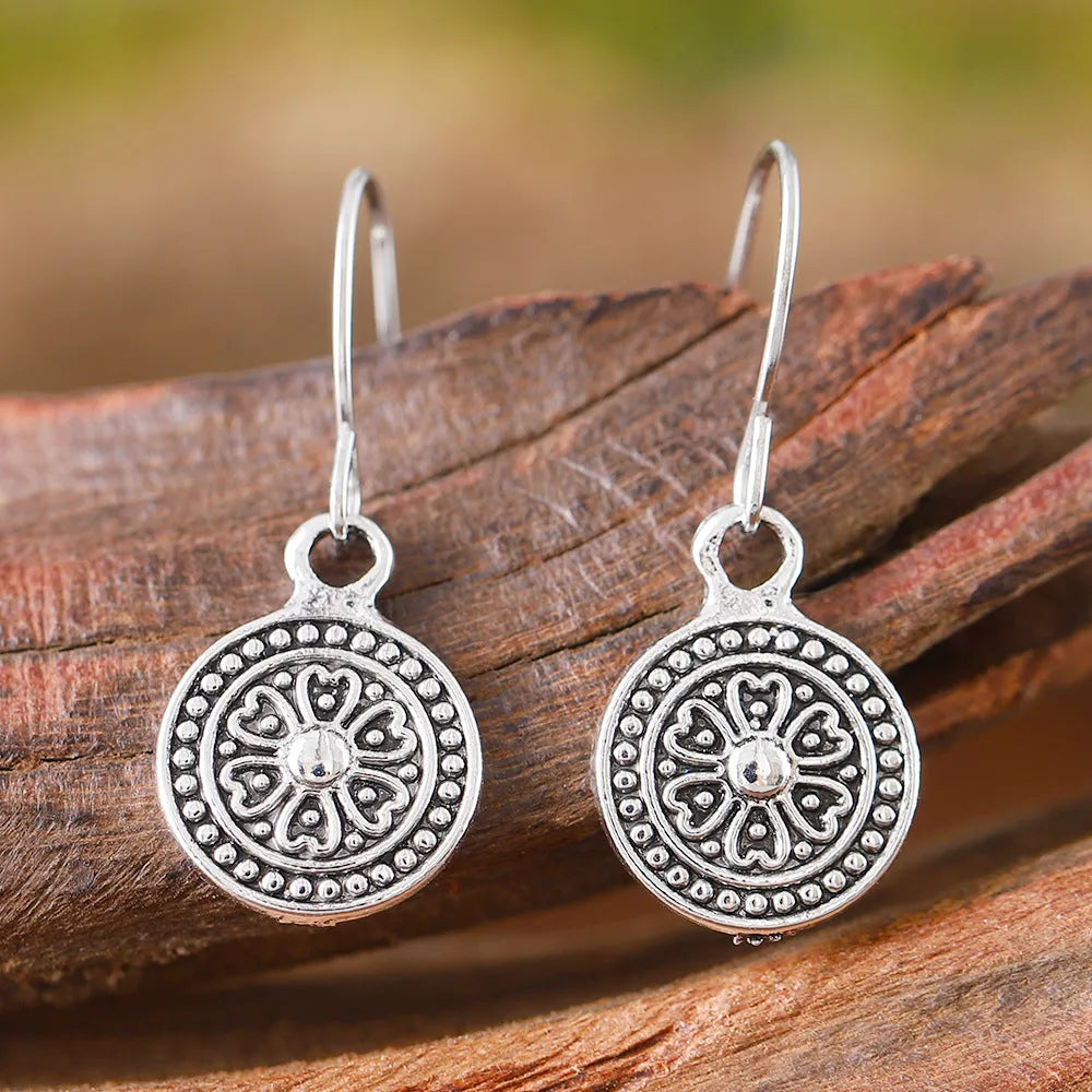Bohemian style retro round earrings with distressed ethnic print and geometric zinc alloy construction