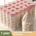 Pink degradable garbage bag with bold drawstring, scented with argy wormwood for mosquito repellent, size 44cm by 48cm.