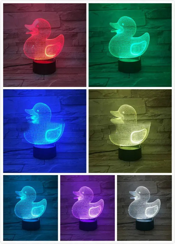 Little yellow duck 3D acrylic night light on ABS base with remote control, showing colour-changing LEDs.