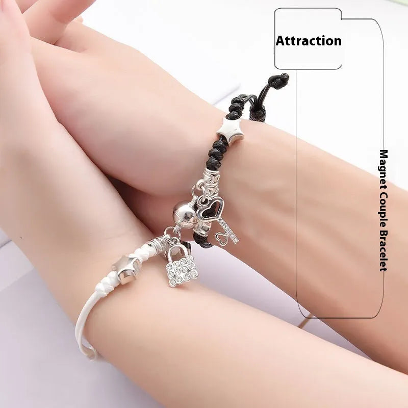 Magnetic couple bracelets with suction clasp showing various charm designs like a crown, clover, and love lock.