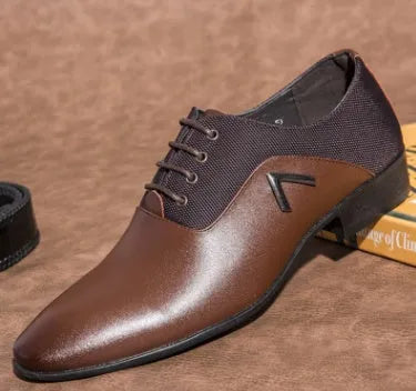 Men's black Oxford shoe with artificial PU upper and rubber sole on a white background