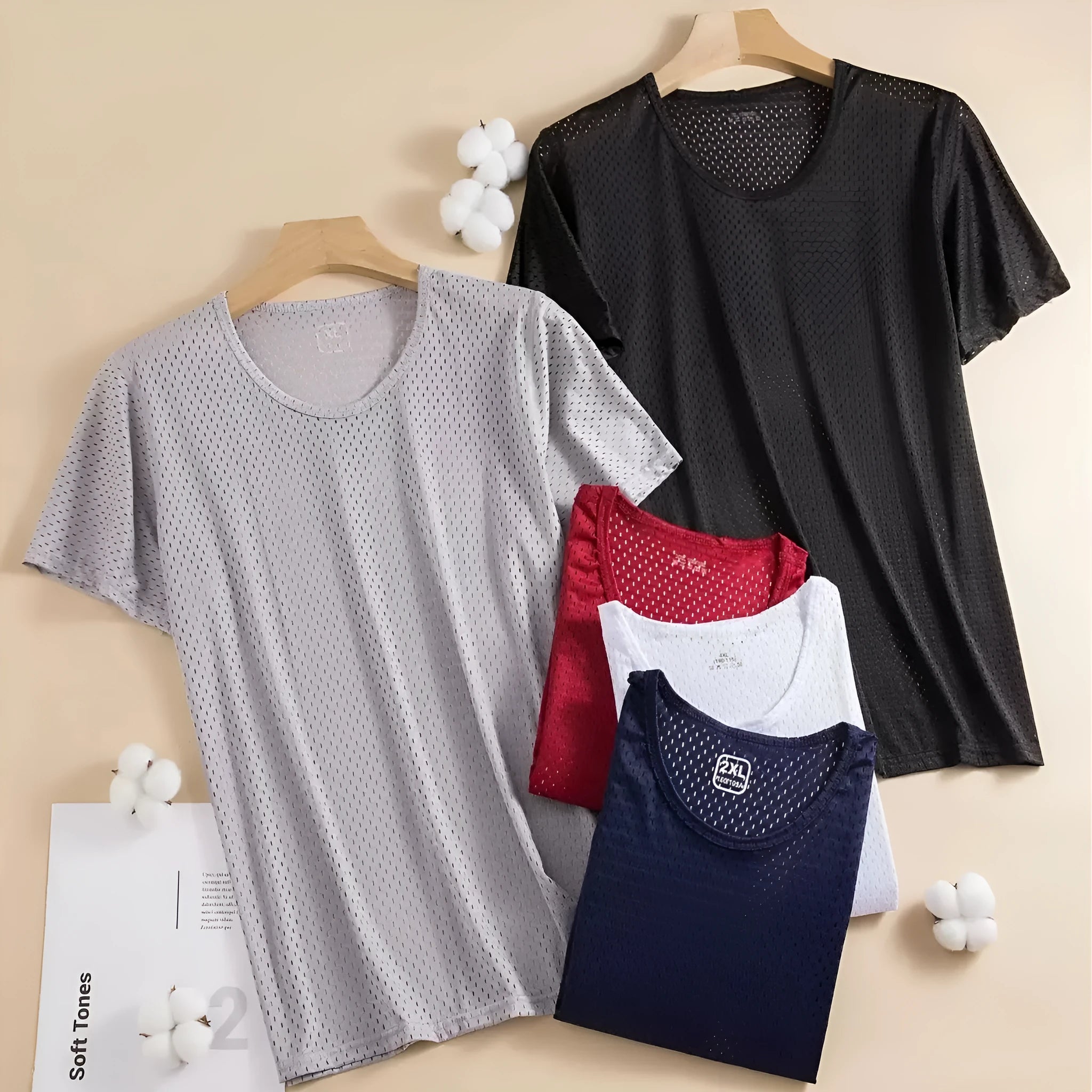 Man wearing a loose-fitting grey ice silk short sleeve crew neck T-shirt.