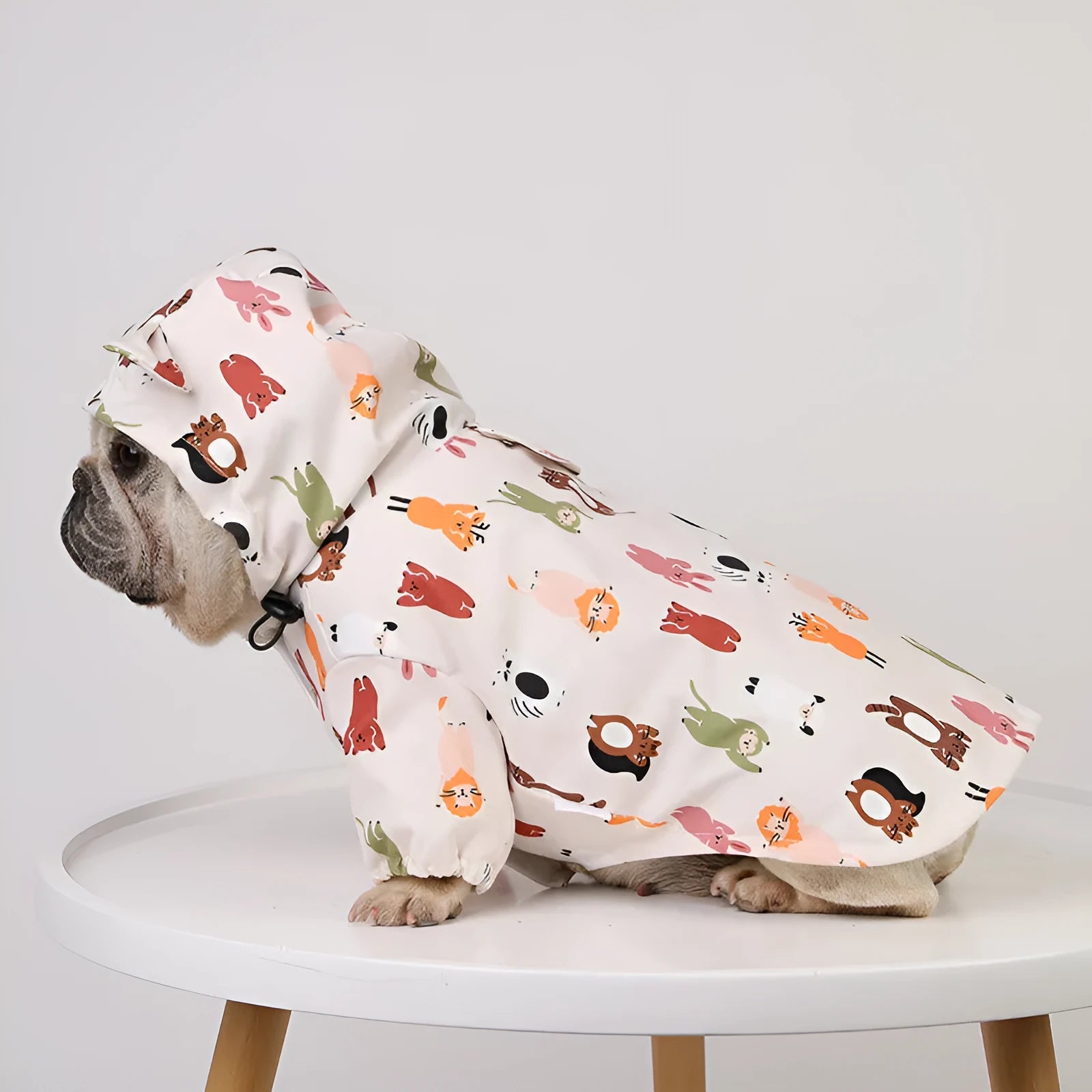 Beige cartoon pattern dog raincoat with double waterproof coating in sizes from small to extra-extra-large