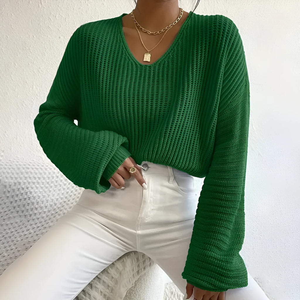 Women's long sleeve pullover in solid colour with loose casual fit and threads decorative element