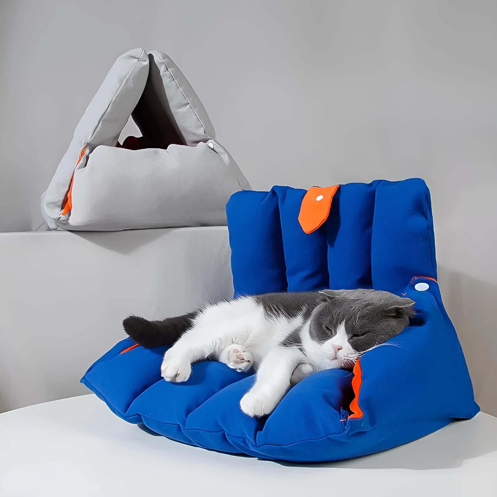 Blue triangular cat sofa bed with drilled holes for combination, removable cotton cover