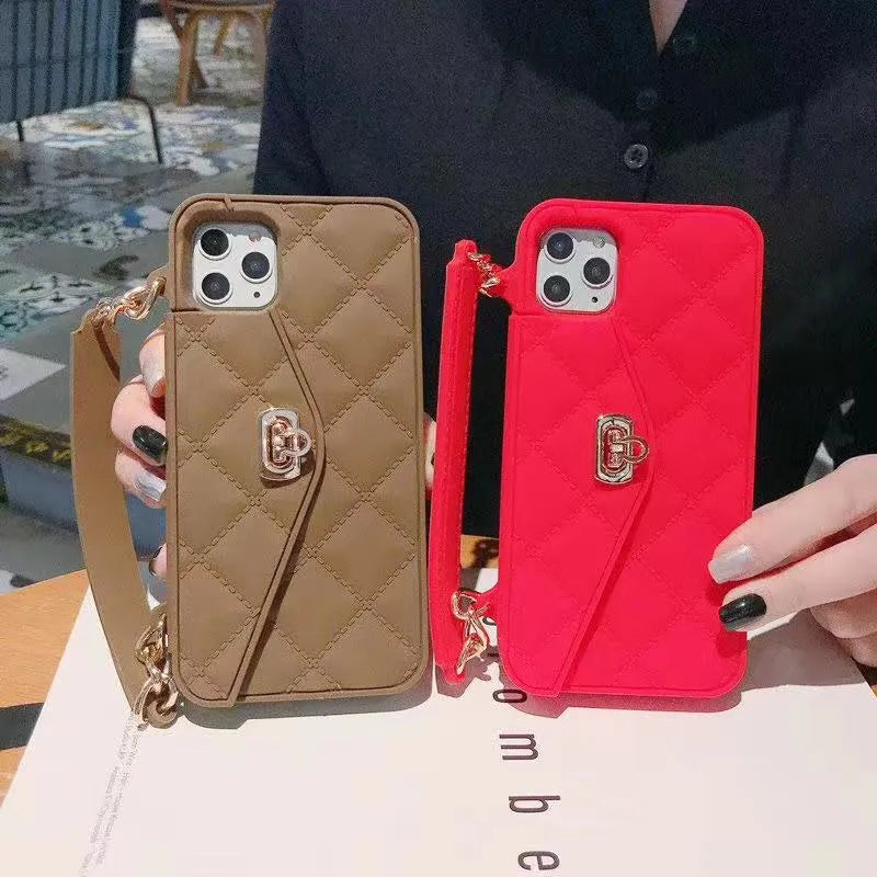 Beige silicone iPhone case with a silver pearl chain lanyard attached, shown next to an iPhone.
