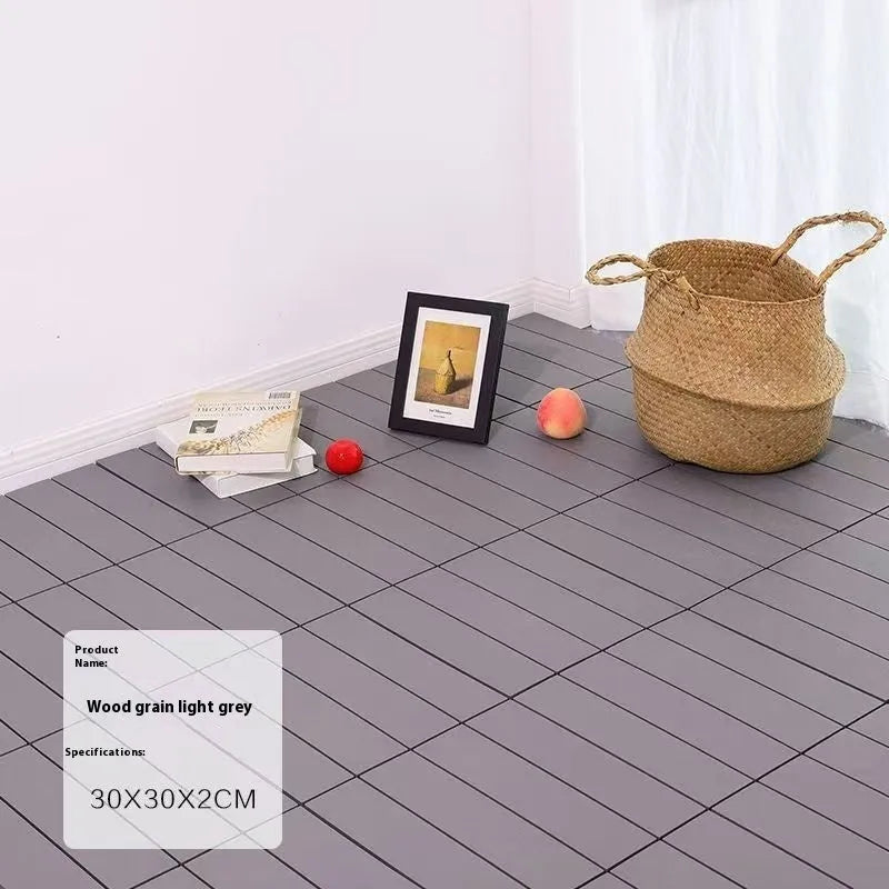 Set of ten wood grain style plastic floor tiles showing non-slip surface, dimensions 300x300 mm.