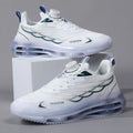 White low-top casual sports shoes with rotating button lace-up and mesh upper on a rubber sole.