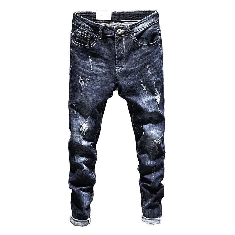 Men's dark blue skinny jeans with a slim fit, shown on a model.