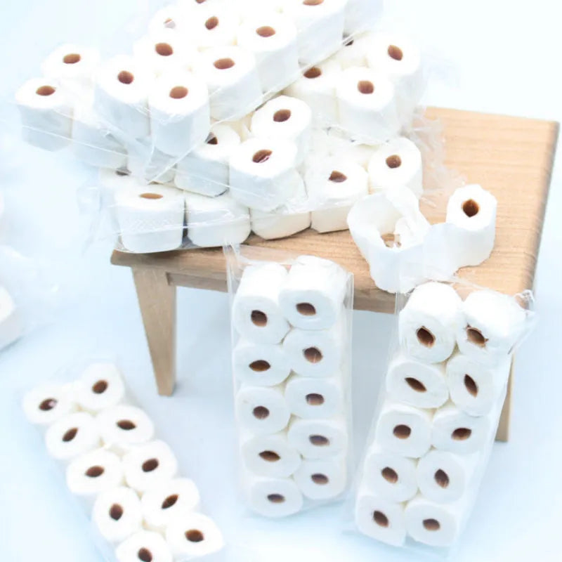 Miniature white paper tissue roll model for dollhouse display