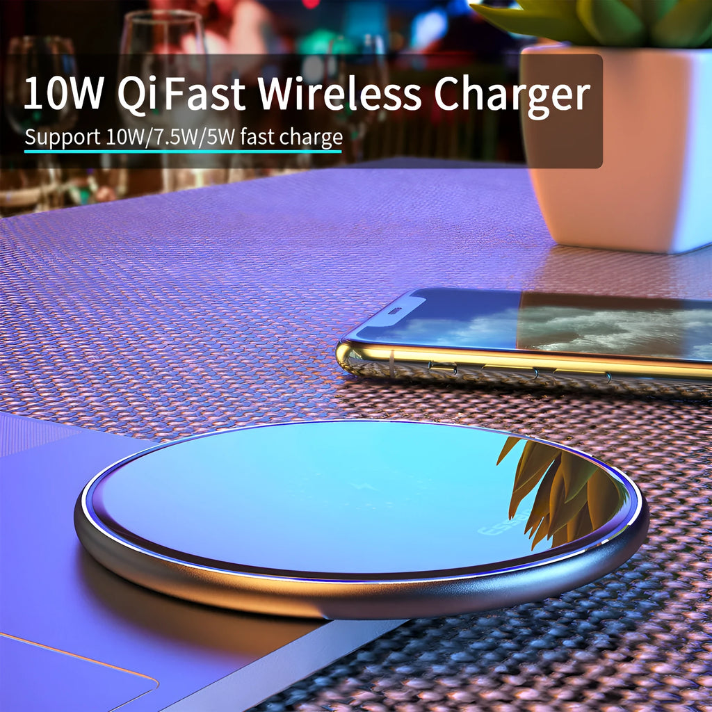 Black wireless charging pad with LED indicator light for smartphones and headphones