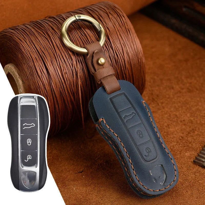 Genuine cowhide leather Porsche key cover with retro bag buckle in blue or brown colour.