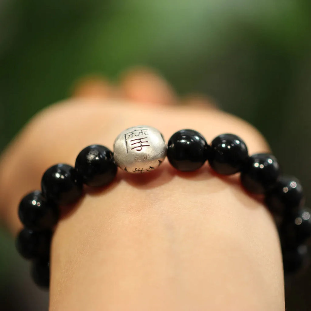 Chinese style black agate bracelet with 10mm beads and sterling silver components