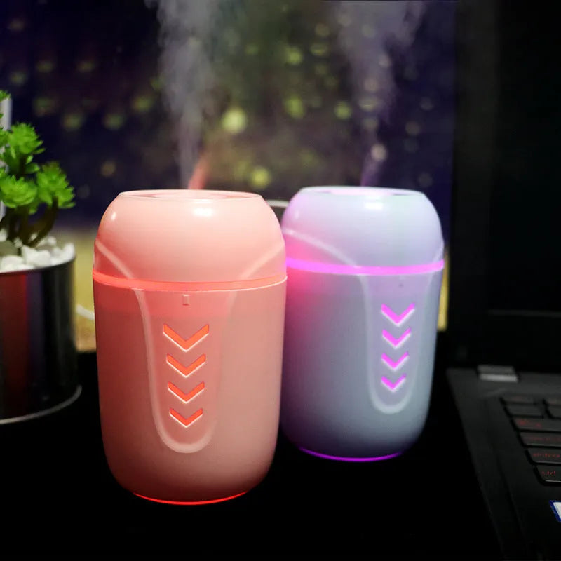Portable car humidifier with columnar design in blue colour showing mist outlet and control dial