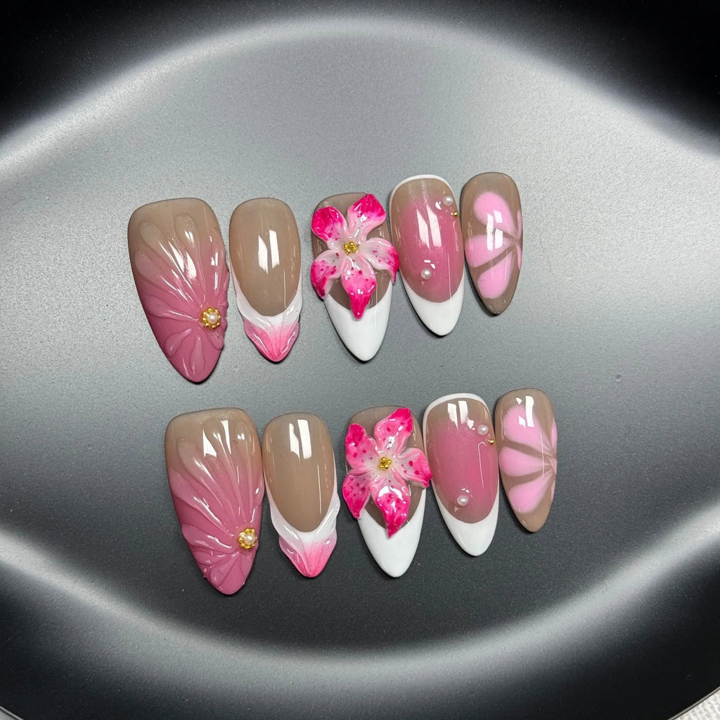 French style lily and fluid ice flower designs on transparent plastic wearable nail armour pieces in four sizes
