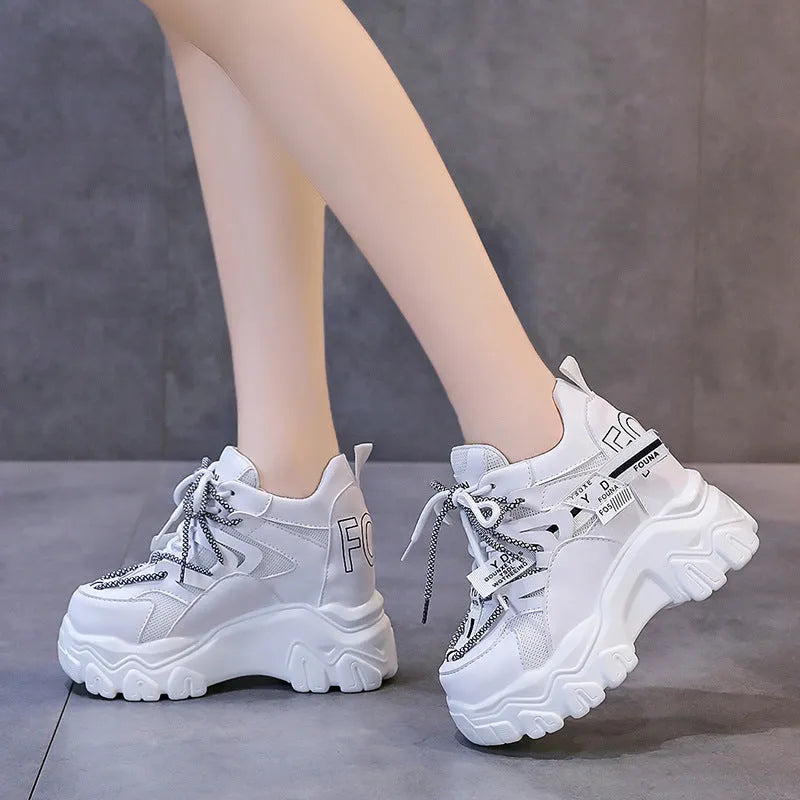 Women's white mesh platform tennis shoes with cross-strap and 6-8cm rubber sole.