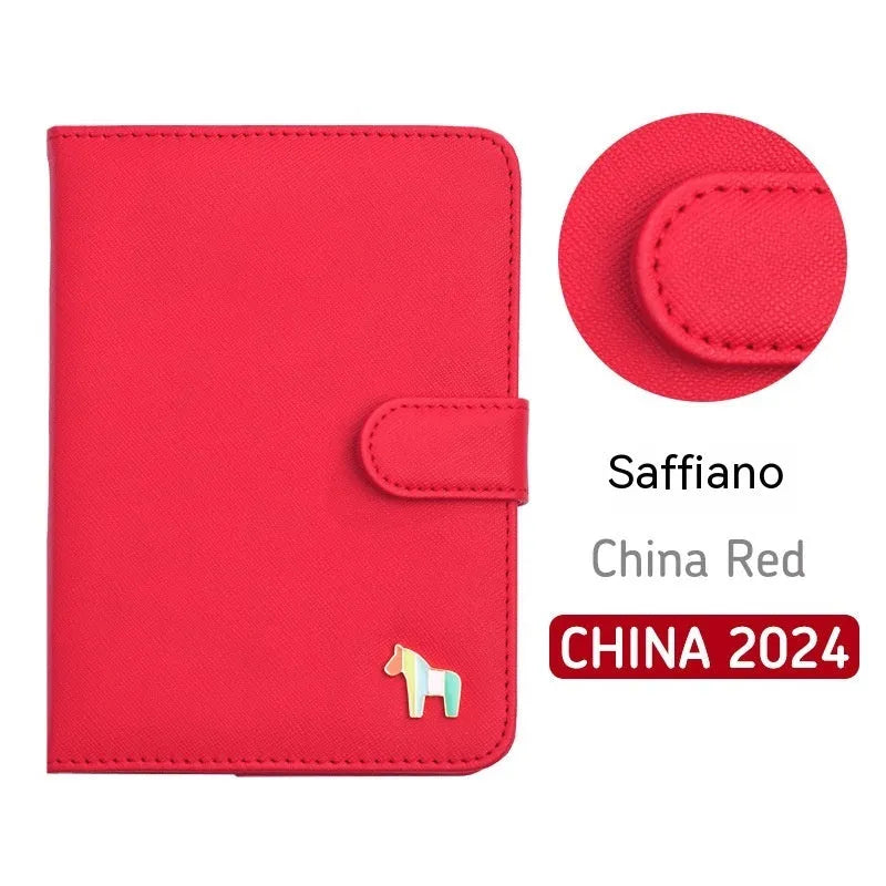 Compact leather-covered 396-day schedule book for hand accounting, shown lying open flat.