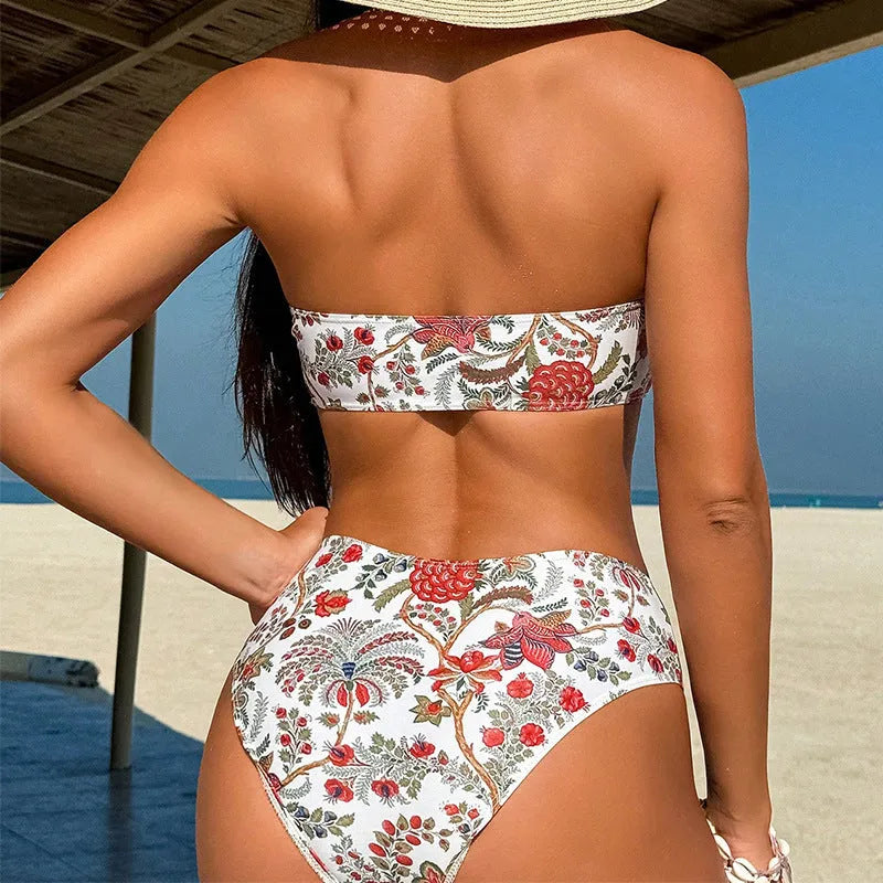 Women's printed bandeau triangle bikini top with matching shorts laid flat.