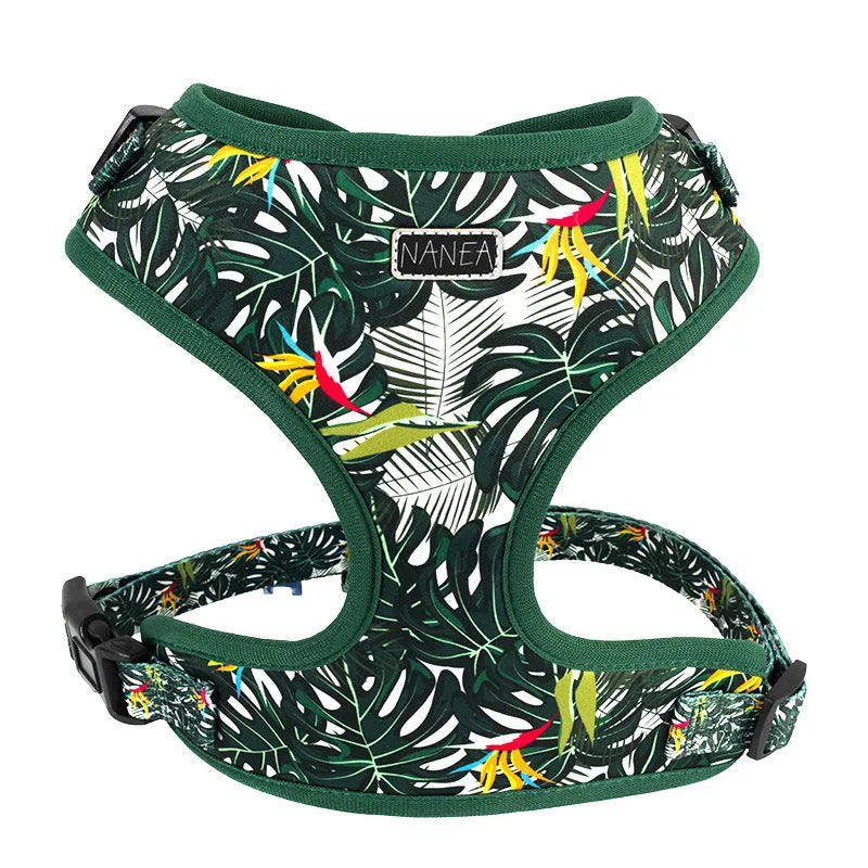 Six-piece pet harness set showing chest and back harness, hand-holding rope, collar, toilet bag, bow tie, and triangular scarf on a cloth background