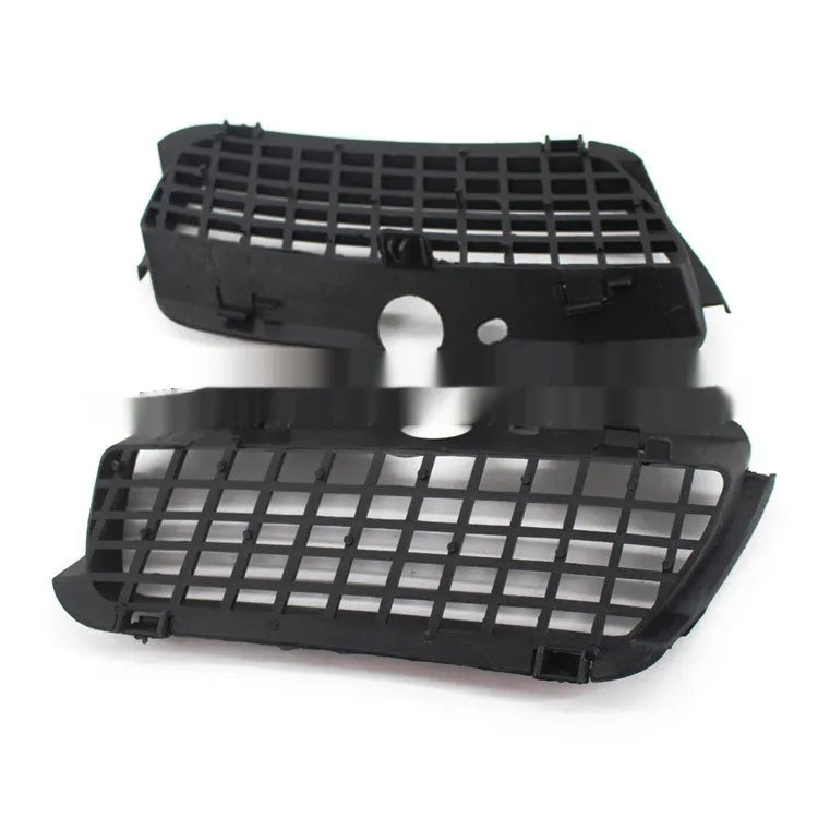 Pair of black ABS plastic Volkswagen Golf 3 fog light covers for the front bumper lower grille.