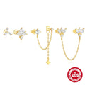 Golden S925 sterling silver earrings with zircon stones in clover, crown, chain, and double piercing designs.