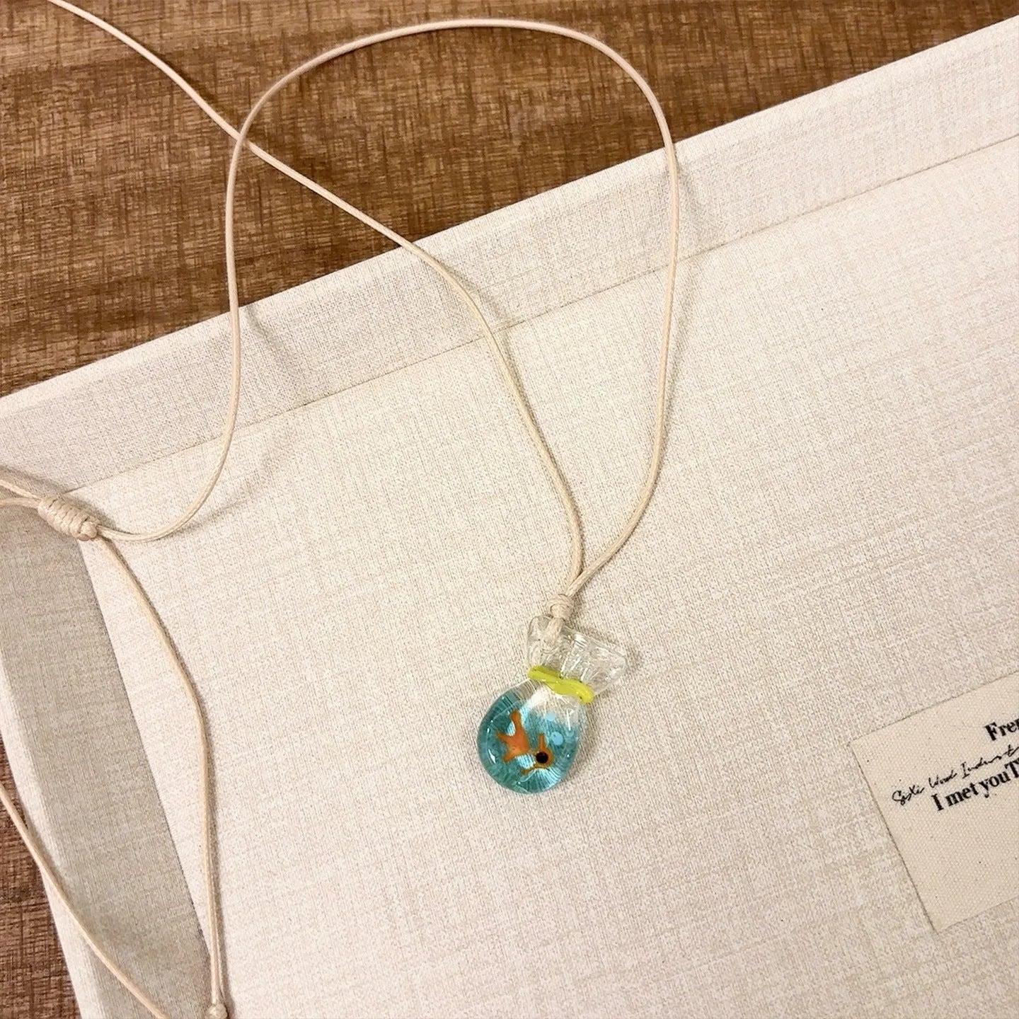 Women's coloured glaze skirt pendant necklace with joker design on cotton linen chain