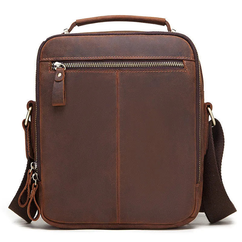 Men's brown genuine leather crossbody bag with single shoulder strap and visible stitching