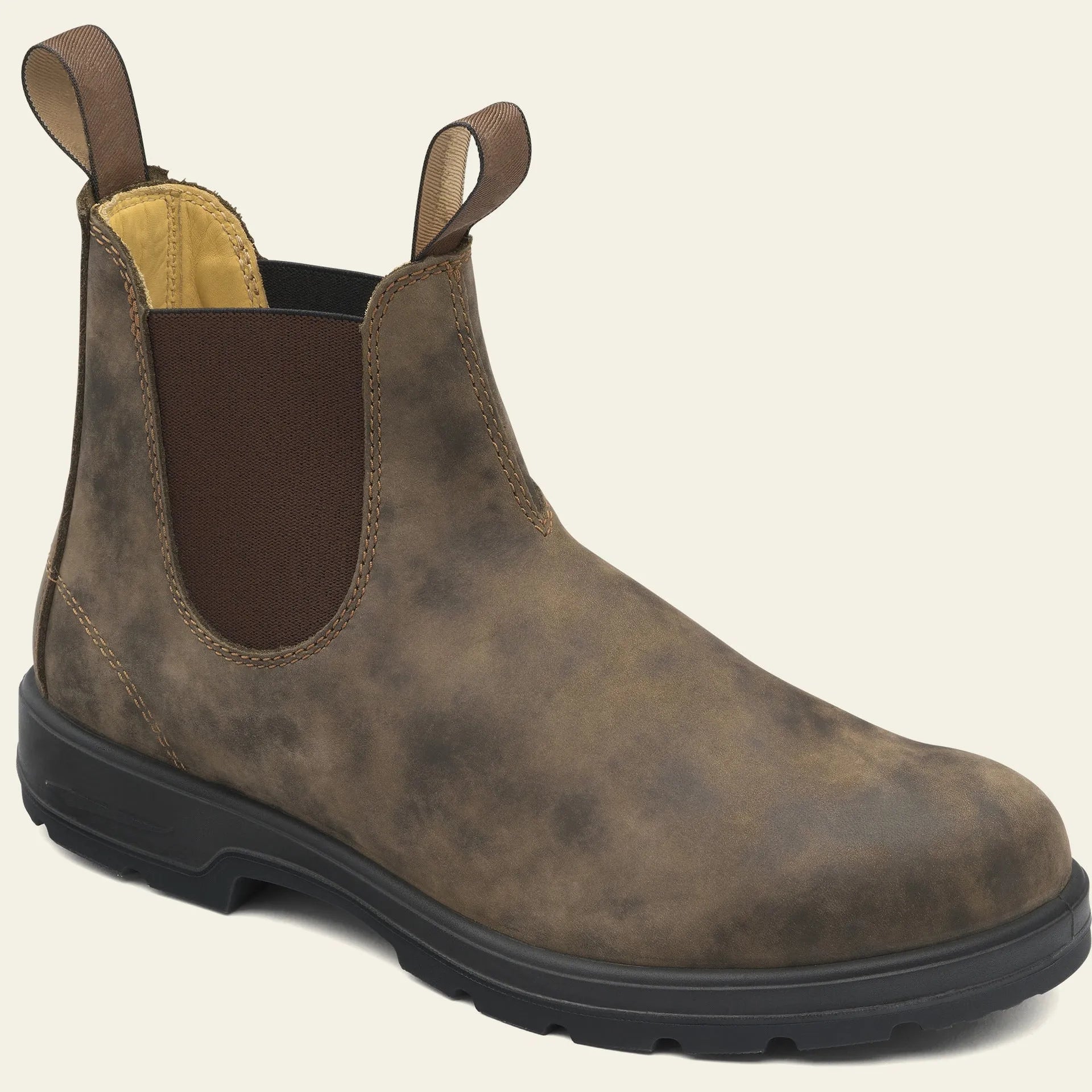 Vintage frosted faux leather Chelsea boots for men and women on a neutral background.