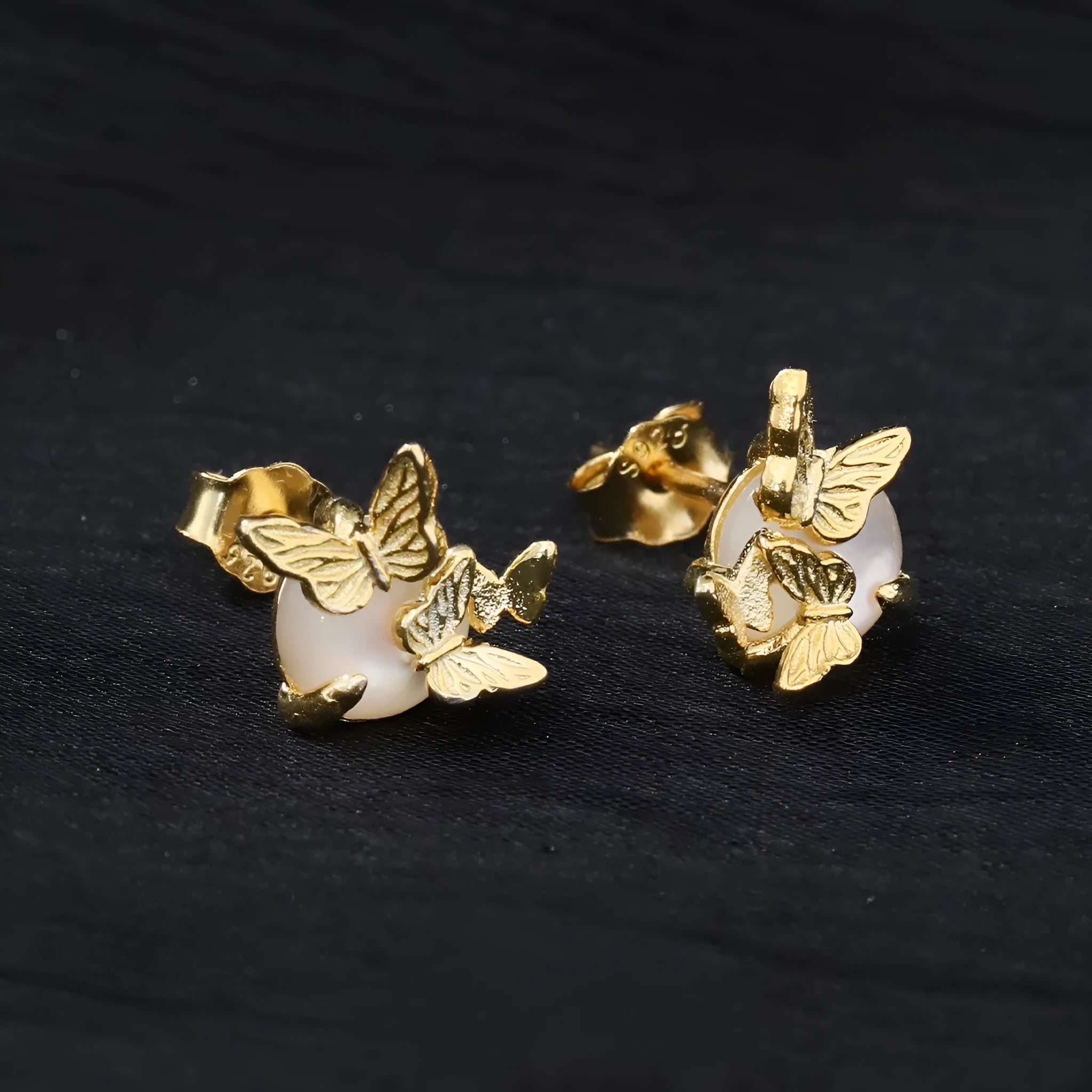 Butterfly ear studs in 925 silver with gold or white gold electroplated finish