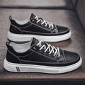 Men's white casual shoes with round toe, low heel, and shallow opening made from breathable PU material