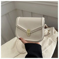 Soft niche texture PU messenger bag in horizontal square clamshell design shown in black colour.