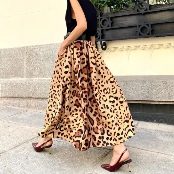 Brown leopard print women's A-line long skirt with elastic waistband on hanger