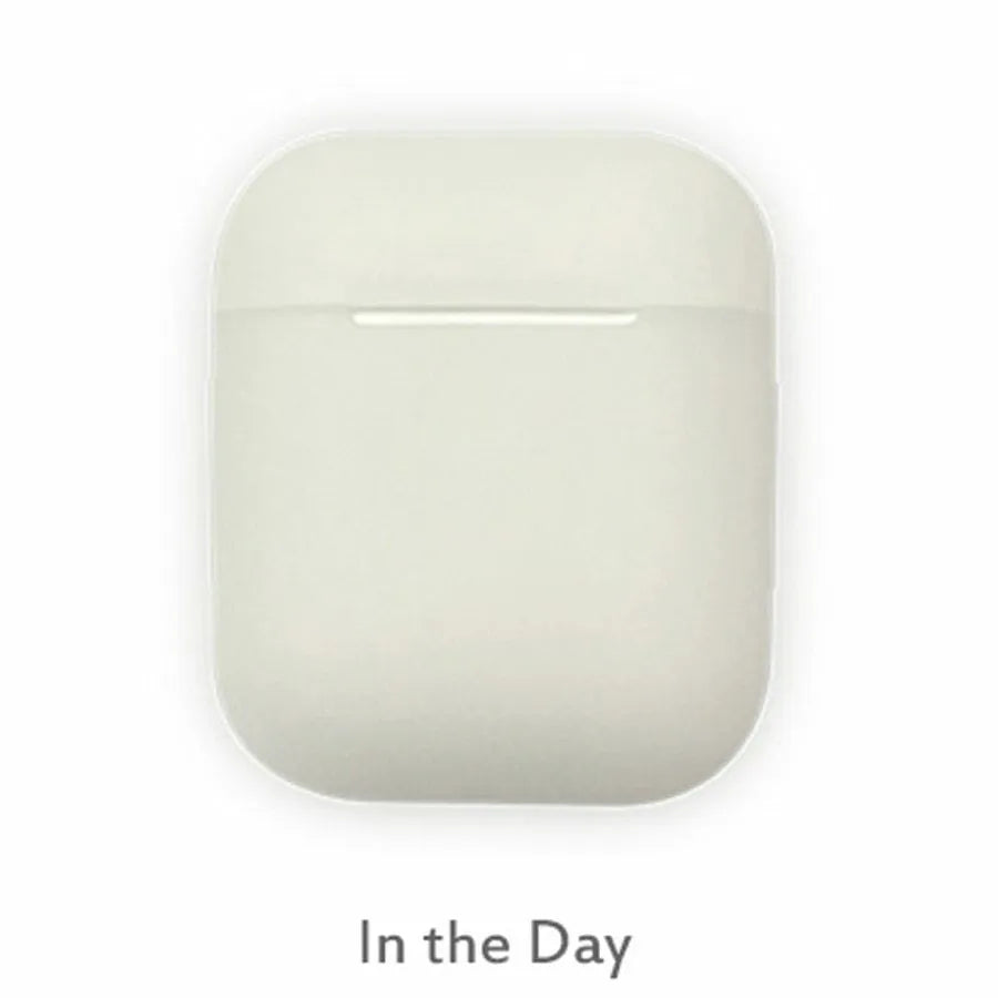 Luminous solid colour silicone flip case for Apple AirPods wireless earphones.