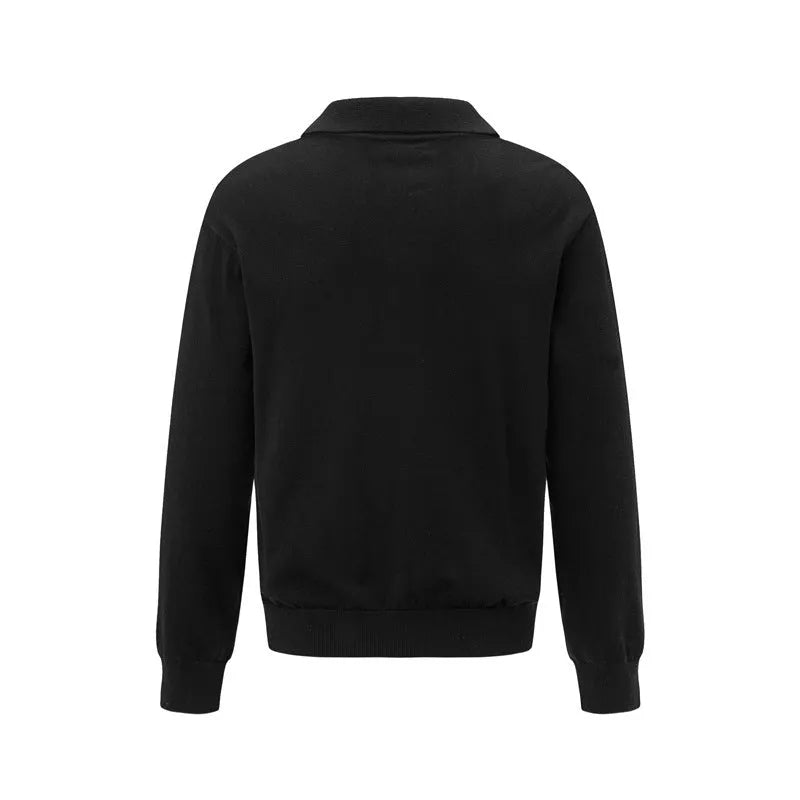 Loose fit acrylic blend pullover sweater in black, shown on a model for casual wear.
