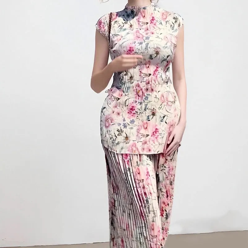 Long sleeve printed high-waist chiffon dress set with matching top and skirt on a model.