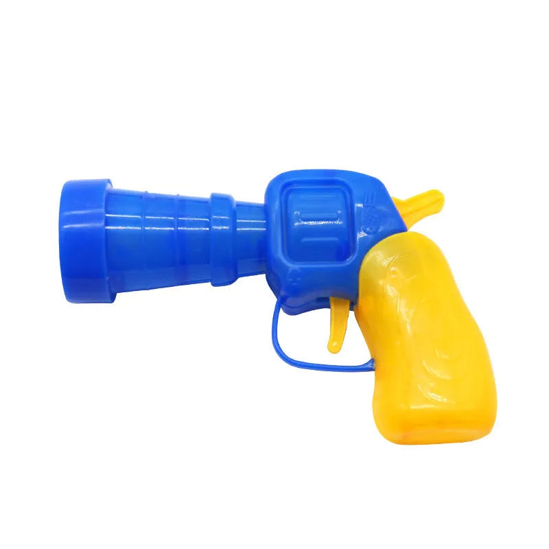 Pet toy set showing 30cm plush launcher gun and several soft 3cm yarn balls for dog fetch games